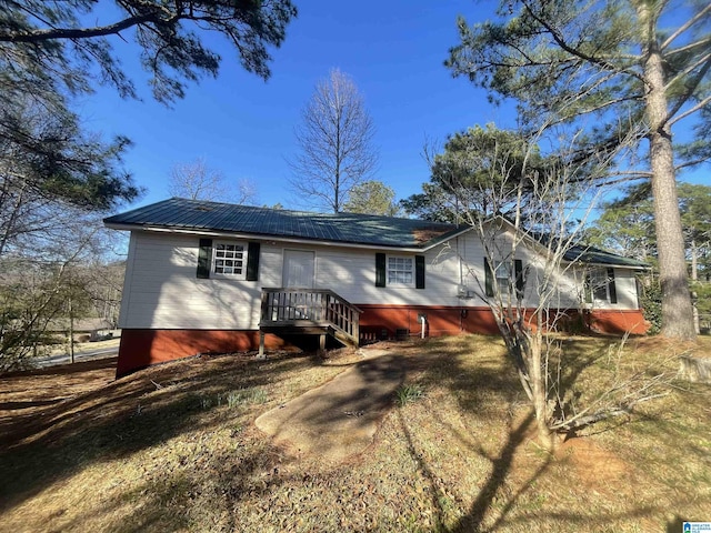 view of front of home with metal roof