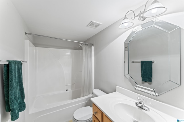 bathroom with visible vents, toilet, shower / bath combo, and vanity