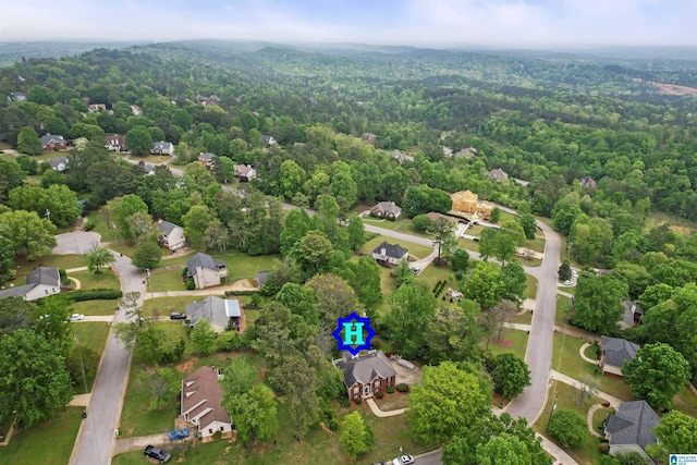 aerial view with a view of trees and a residential view