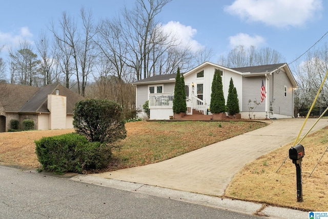 view of front of home with concrete driveway