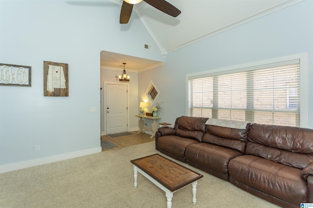 carpeted living area featuring visible vents, high vaulted ceiling, ceiling fan with notable chandelier, crown molding, and baseboards