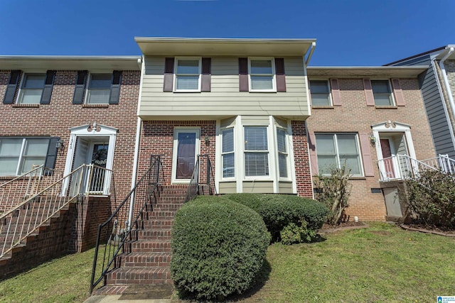 multi unit property featuring brick siding