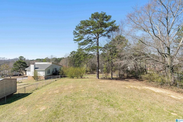 view of yard featuring fence