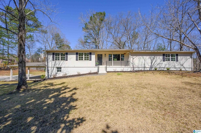 ranch-style home with a front yard