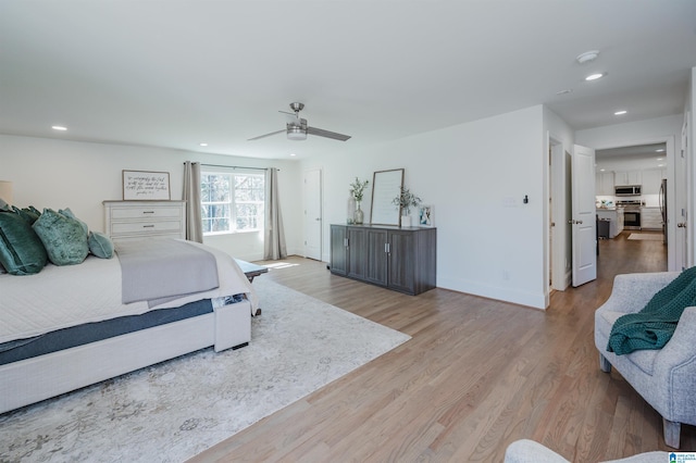 bedroom with recessed lighting, baseboards, wood finished floors, and ceiling fan