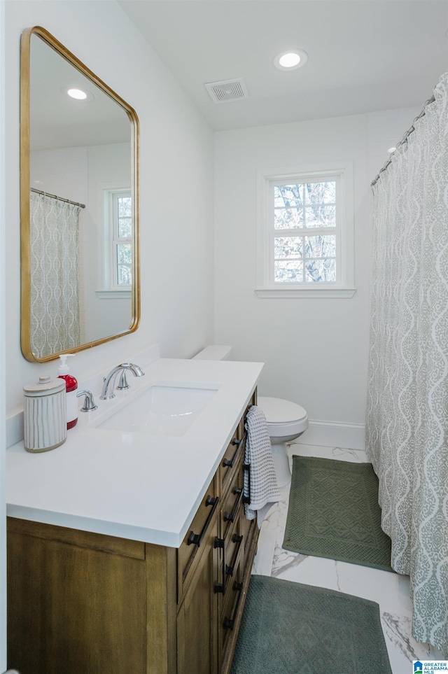 bathroom featuring vanity, visible vents, recessed lighting, toilet, and marble finish floor