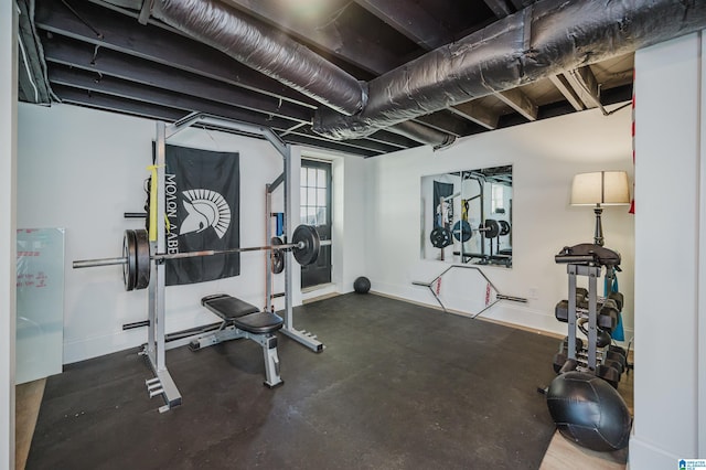 exercise room with baseboards