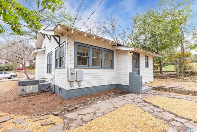 bungalow featuring crawl space and fence