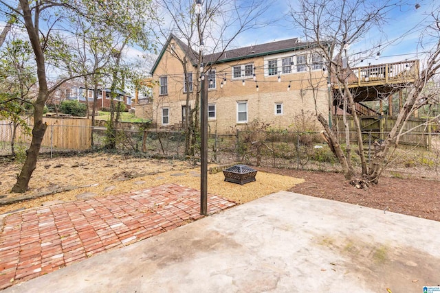 view of basketball court with a fenced backyard