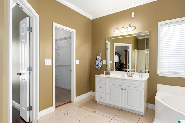 full bathroom with vanity, tile patterned floors, a spacious closet, and ornamental molding