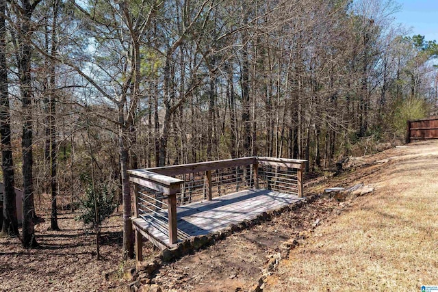 exterior space featuring a wooded view