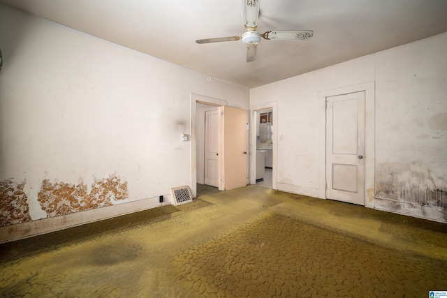 unfurnished bedroom with a ceiling fan, concrete flooring, visible vents, and ensuite bathroom