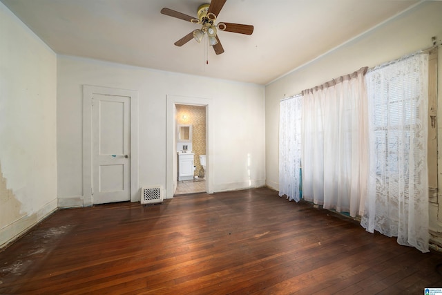 spare room featuring a ceiling fan and hardwood / wood-style flooring