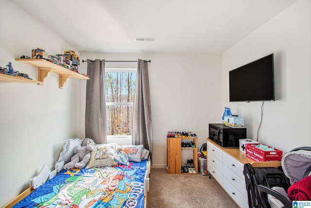 carpeted bedroom with visible vents