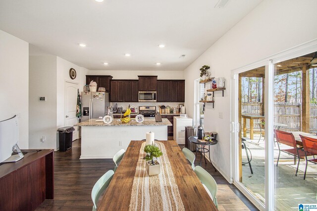 dining area featuring dark wood-style floors and recessed lighting