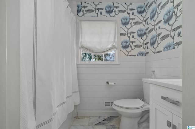 full bathroom featuring visible vents, marble finish floor, toilet, and vanity