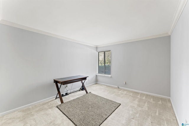 empty room with baseboards, carpet, and ornamental molding