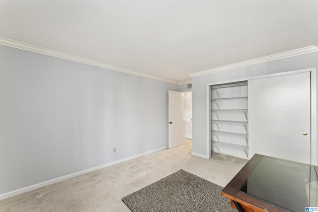 bedroom featuring light carpet, a closet, baseboards, and ornamental molding