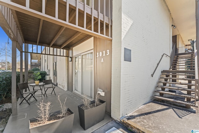 view of patio with stairway