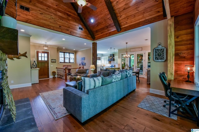 living room with visible vents, baseboards, wood ceiling, and hardwood / wood-style floors