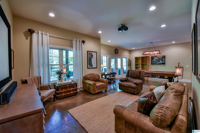 living area with pool table, recessed lighting, french doors, and concrete flooring