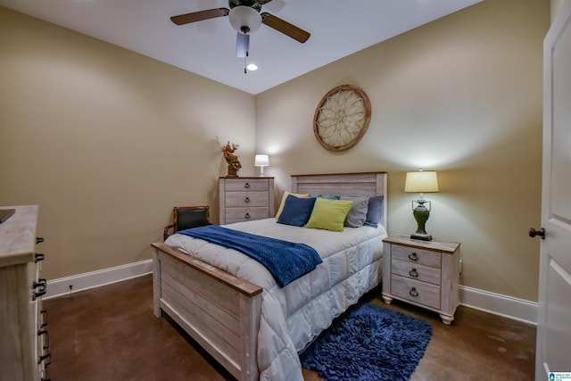 bedroom with ceiling fan and baseboards