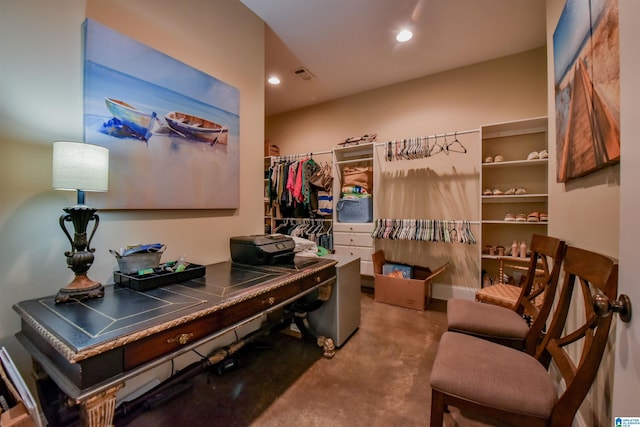 office area with recessed lighting, visible vents, and concrete floors