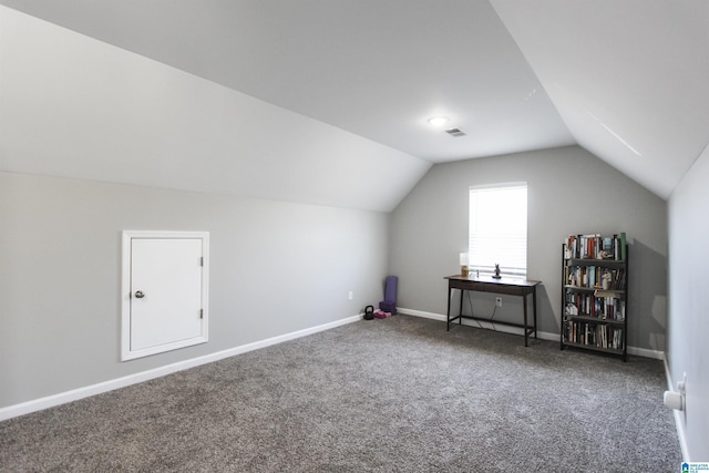 bonus room with vaulted ceiling, baseboards, visible vents, and carpet floors