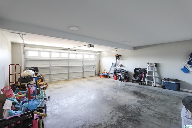 garage featuring a garage door opener