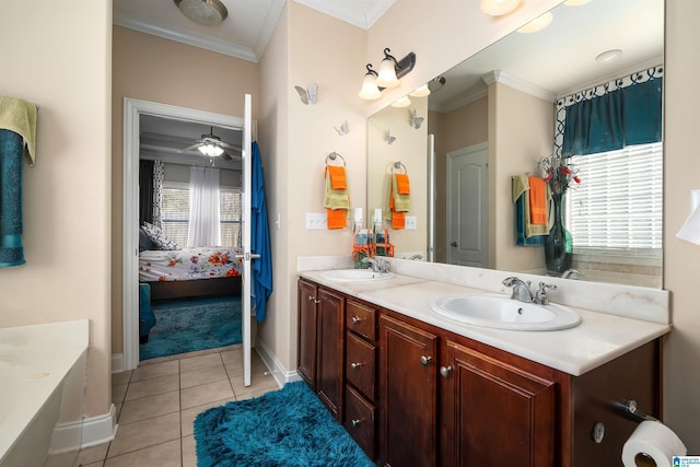 full bath with ornamental molding, connected bathroom, and a sink