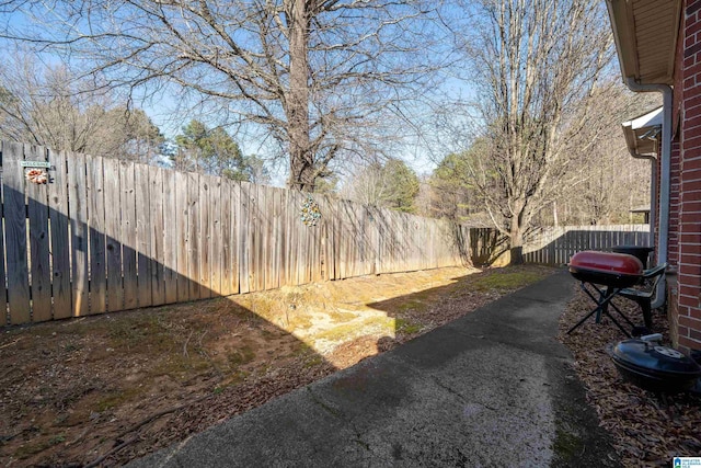 view of yard with a fenced backyard