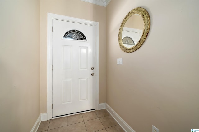 entryway featuring light tile patterned floors and baseboards