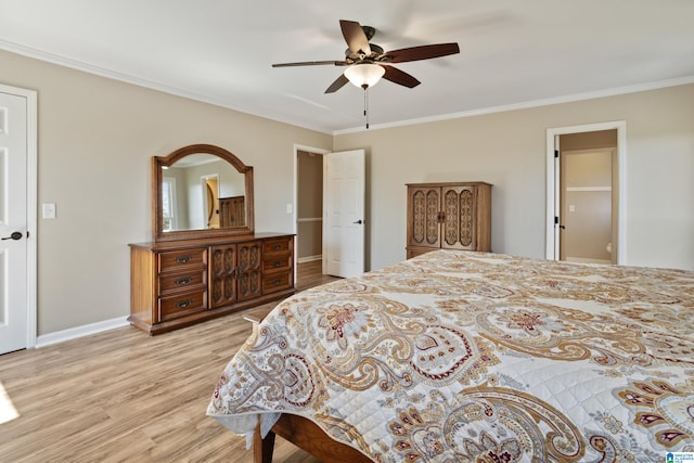 bedroom featuring a ceiling fan, baseboards, light wood finished floors, and ornamental molding