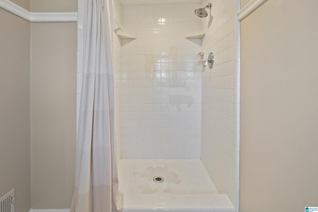 bathroom featuring a stall shower