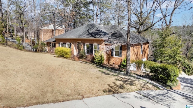 view of front of home with brick siding