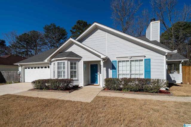 ranch-style house with a front lawn, a chimney, and an attached garage