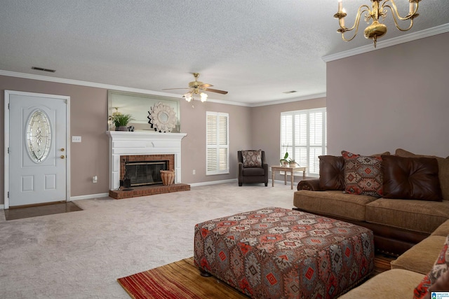 living room featuring visible vents, carpet flooring, a brick fireplace, and ornamental molding