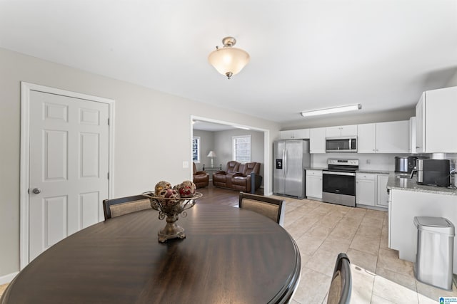 dining room with light tile patterned floors