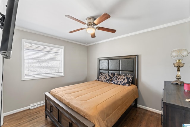 bedroom with visible vents, ornamental molding, and dark wood-style flooring