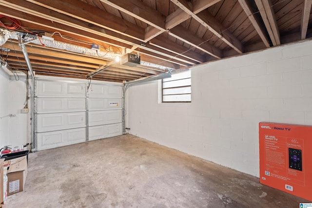 garage featuring a garage door opener