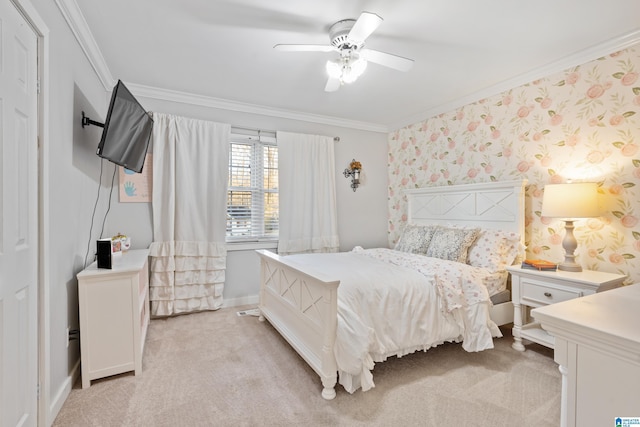 bedroom with wallpapered walls, crown molding, light colored carpet, and baseboards