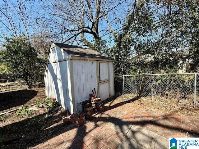 view of shed featuring a fenced backyard