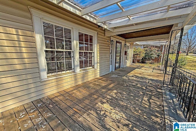 wooden terrace with a pergola