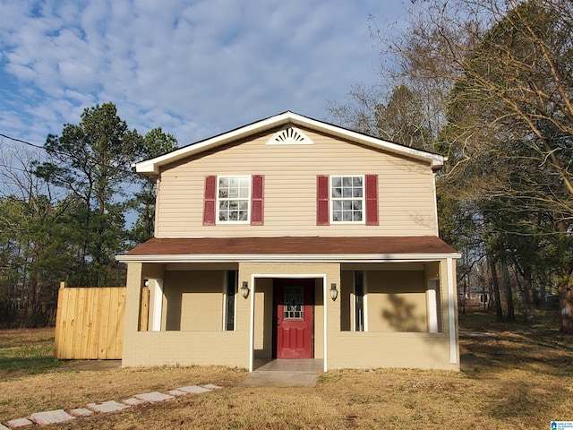 traditional-style home featuring brick siding