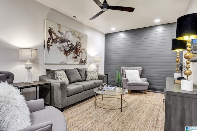 living room featuring visible vents, recessed lighting, and a ceiling fan