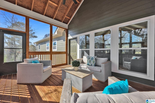 sunroom with vaulted ceiling