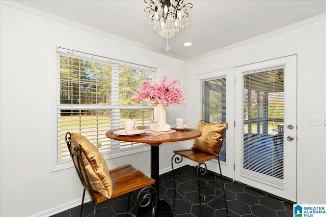 dining room featuring crown molding, baseboards, breakfast area, a notable chandelier, and dark tile patterned flooring