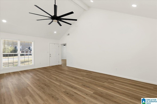 unfurnished room featuring wood finished floors, baseboards, high vaulted ceiling, recessed lighting, and beamed ceiling