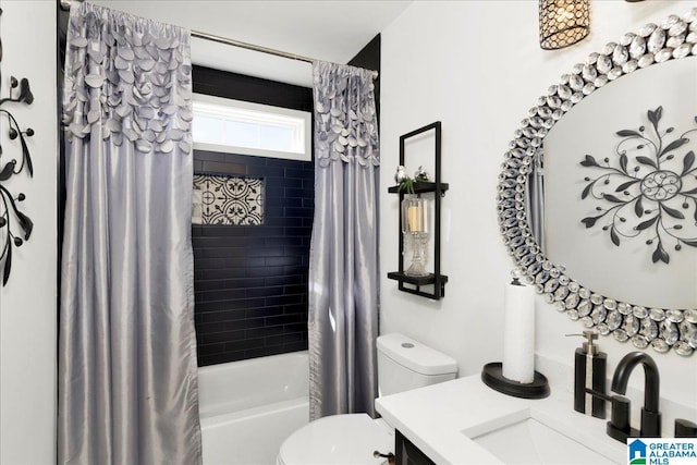 bathroom featuring vanity, toilet, and shower / tub combo