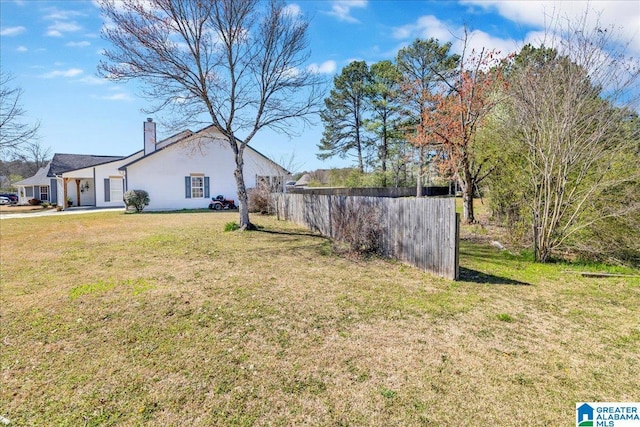 view of yard featuring fence